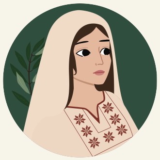 Portrait of Dania wearing an embroidered dress and white headscarf